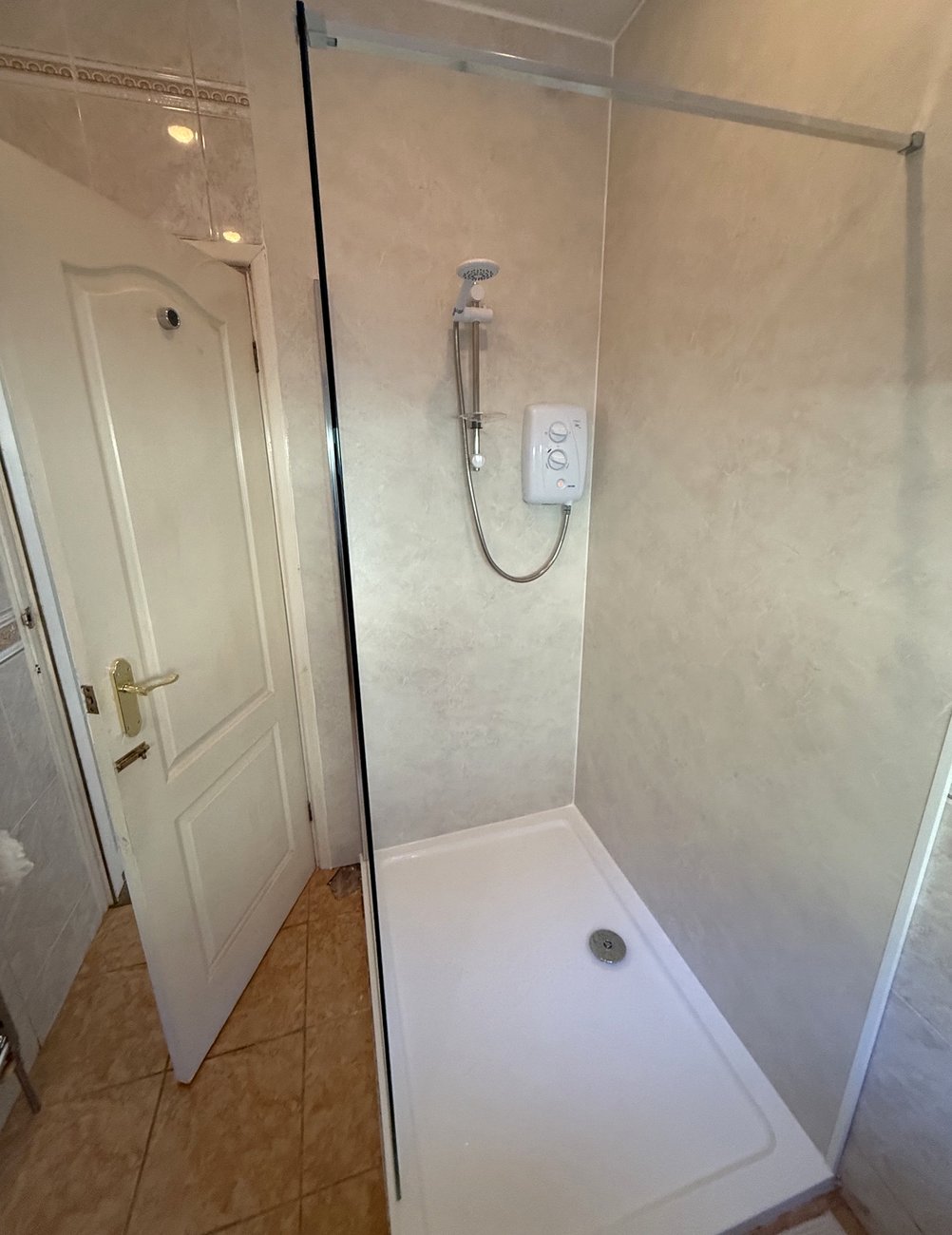 Electric shower and wall panels